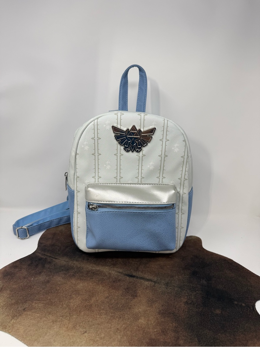 White and Light Blue Mini The Legend of Zelda Backpack with Crest Accent